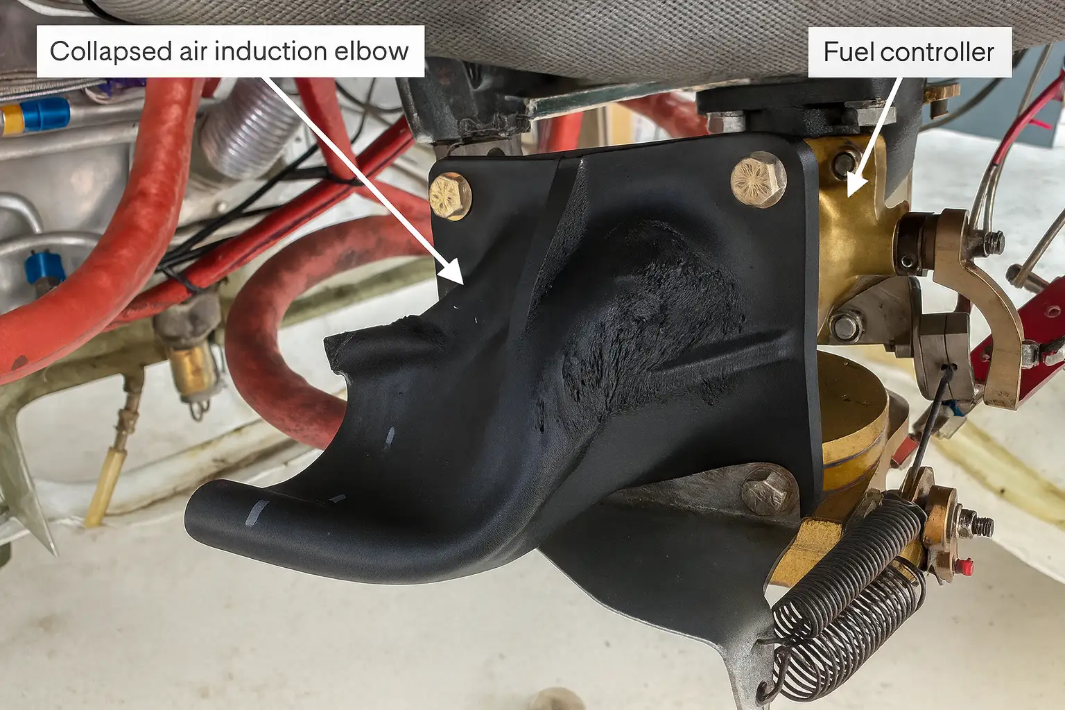 Collapsed Cozy Mk IV 3D-printed induction elbow after heat exposure