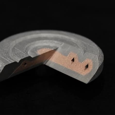 Multi-material metal 3D printing