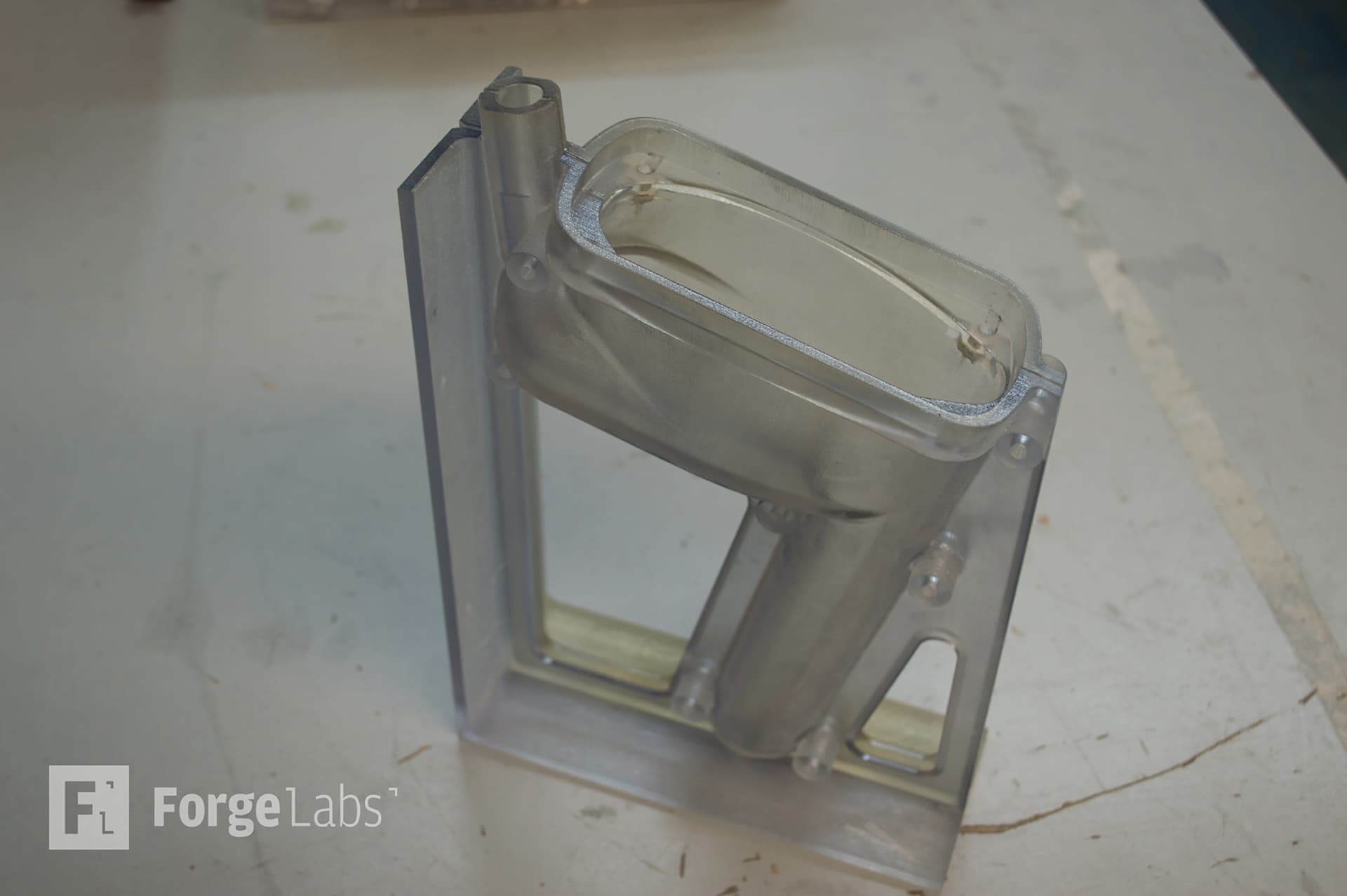 VeroClear transparent mold being used for cold casting, showing clear visibility of the casting process