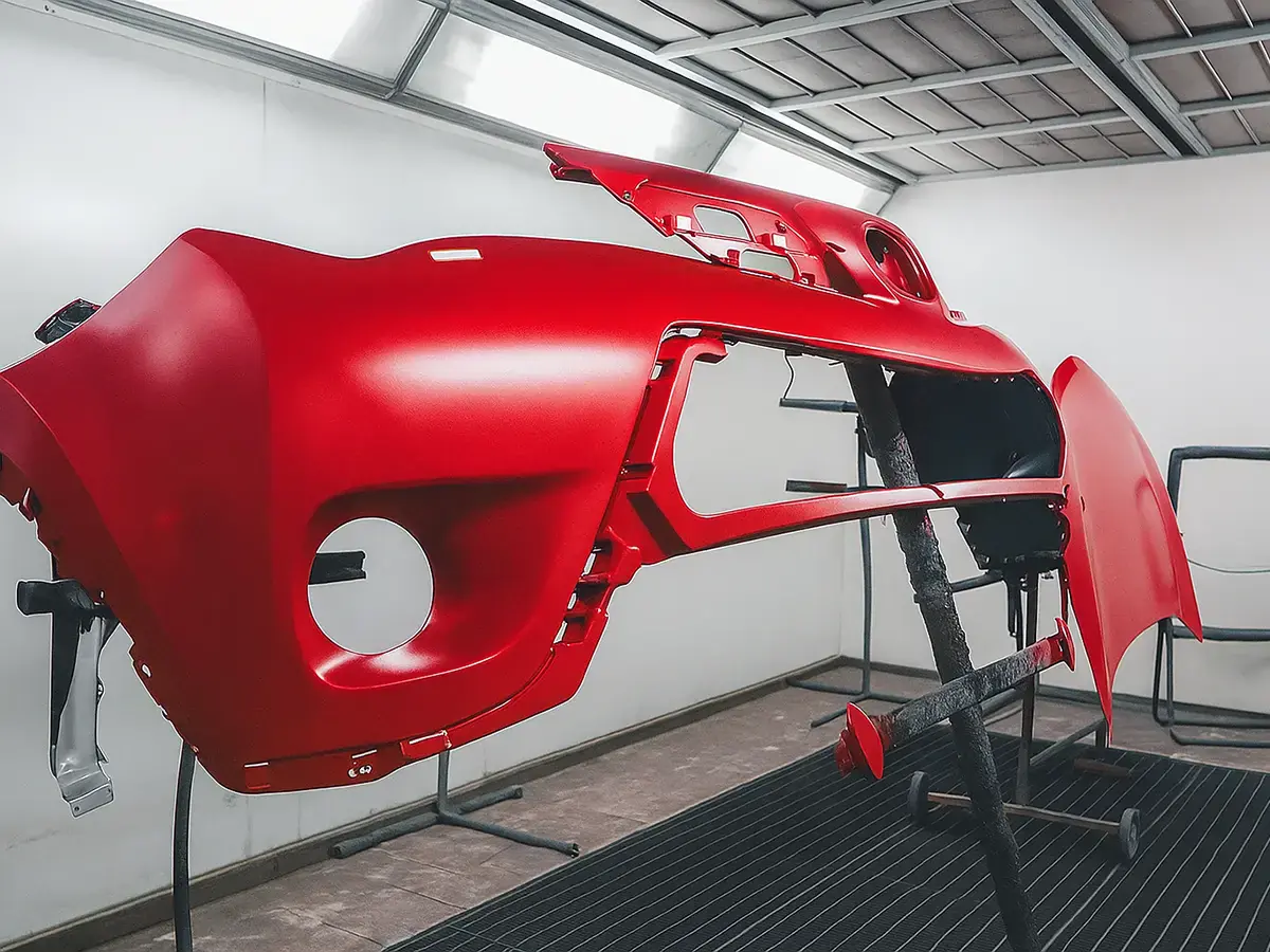 Painted prototype body panel in a spray booth