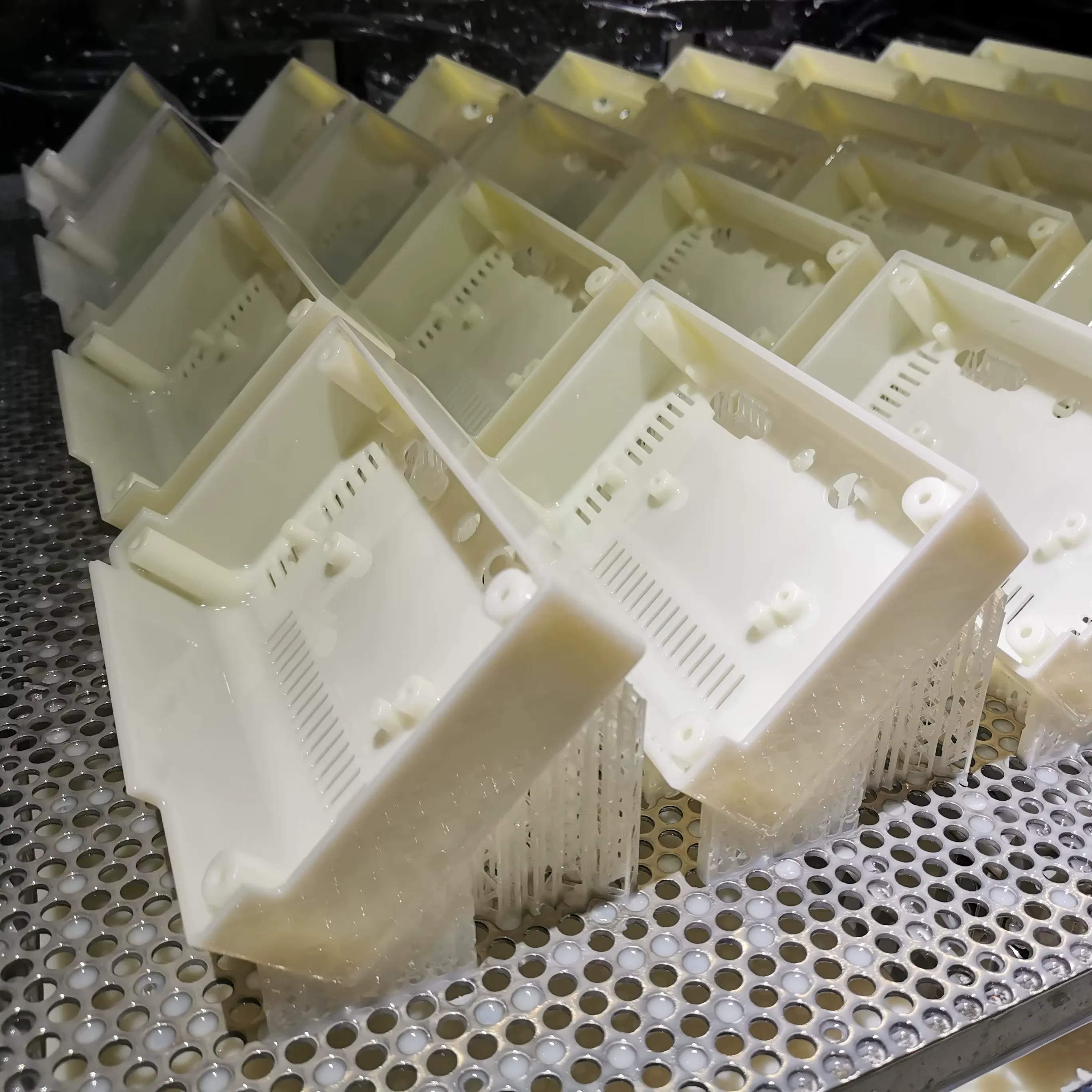 Accura ClearVue Full production tray of transparent electronic enclosures for low volume manufacturing