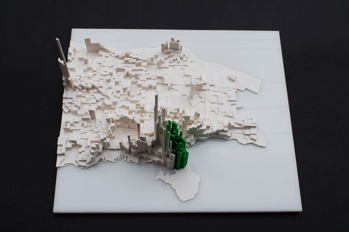 3D printed architectural massing model showing detailed building forms and urban context