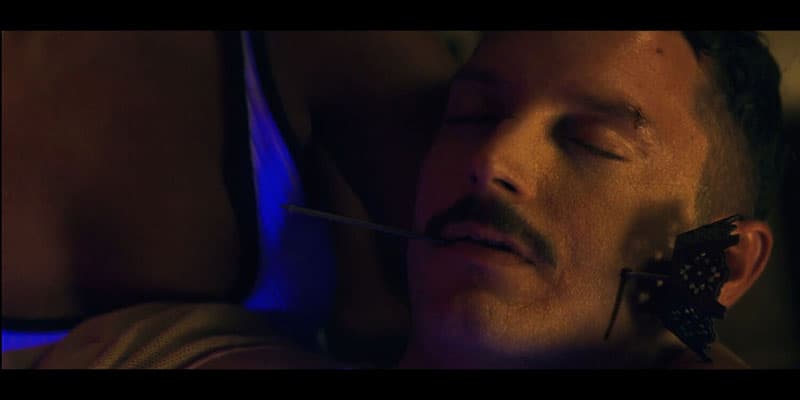 Elijah Wood with 3D printed movie prop showing receipt spike through cheek effect
