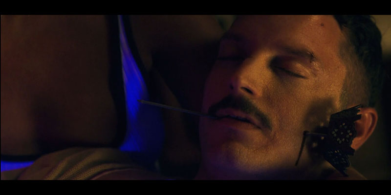 Elijah Wood with 3D printed movie prop showing receipt spike through cheek effect