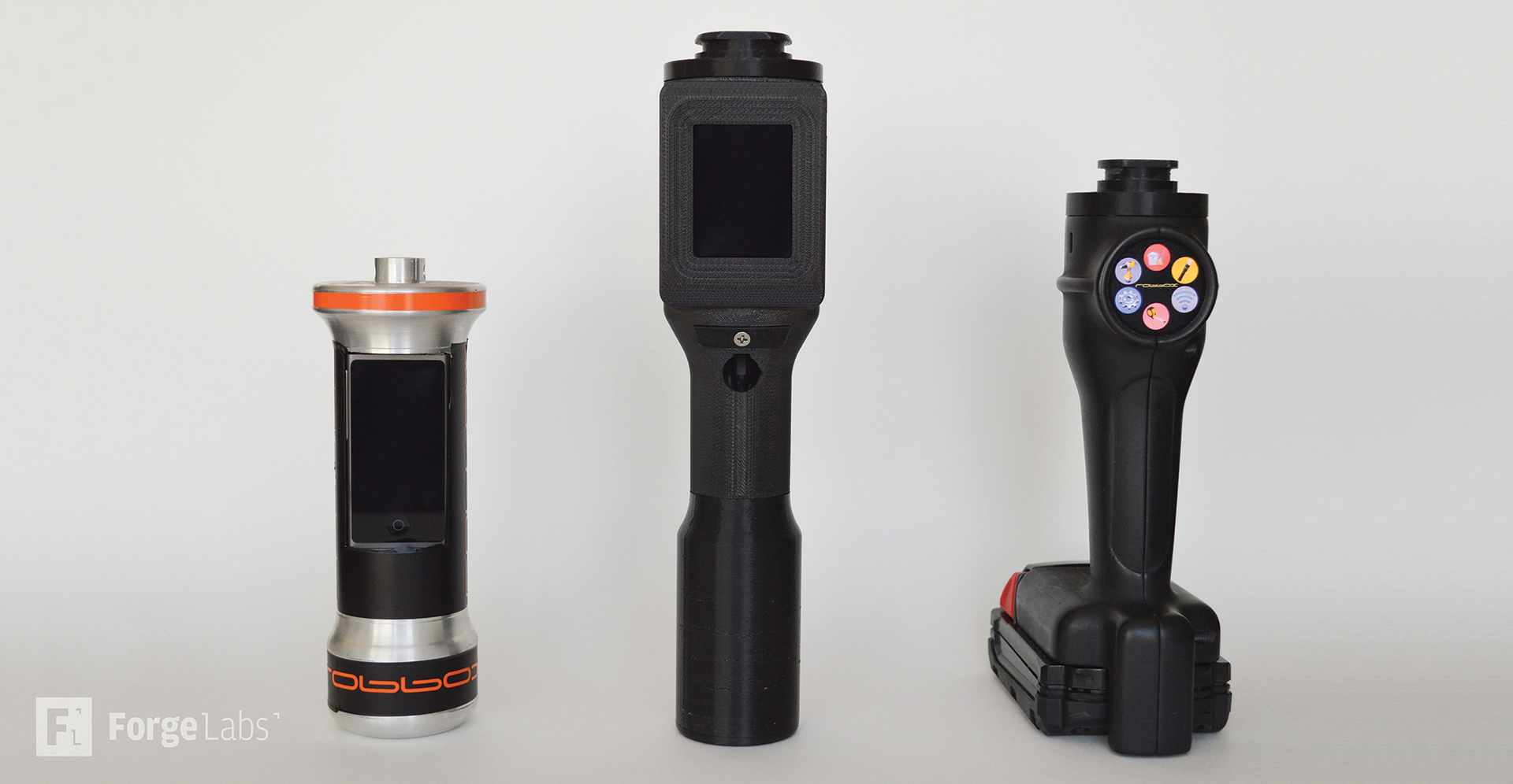 Multiple iterations of 3D printed drill and driver enclosures showing rapid prototyping evolution